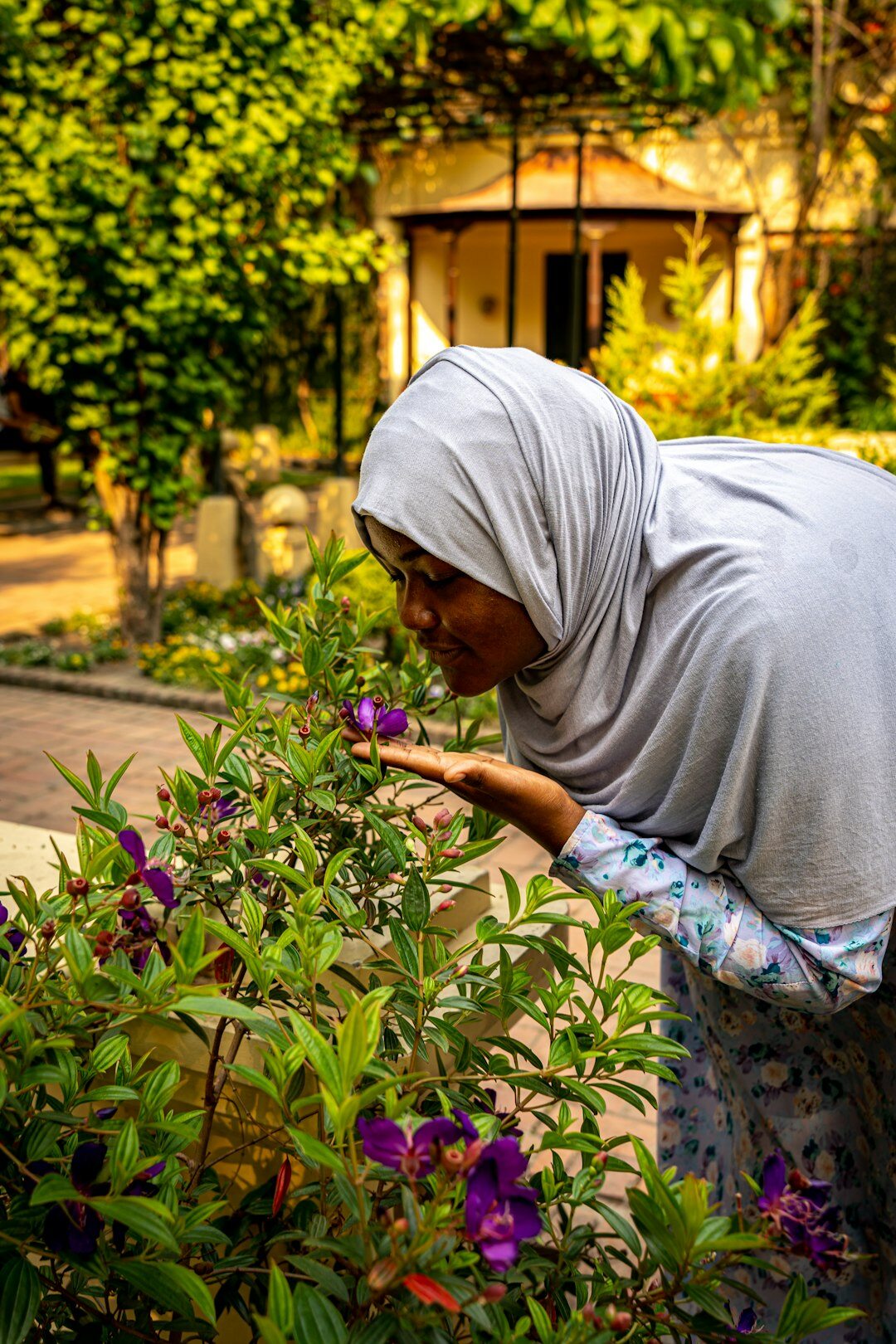 woman gardening with flowers